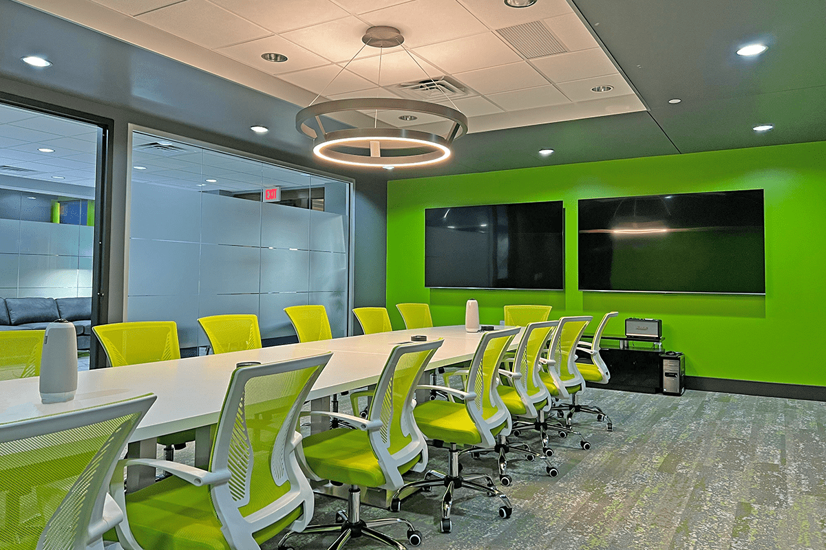 A large conference room with glass doors.